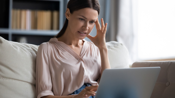 Woman trying to figure How to Build Proficiency in Your Tech-Averse Clients